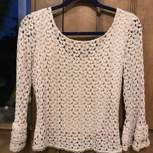 Free People tan long crocheted with bell sleeves.